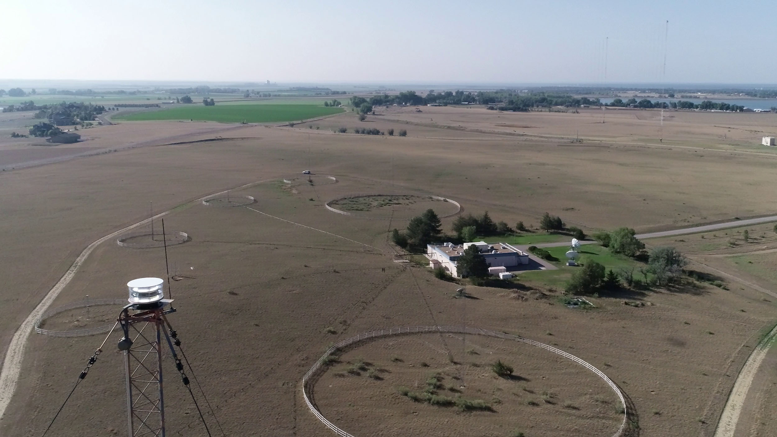 photo taken from an airplane, looking down on the buildings and antennae of the WWV radio station in rural Colorado