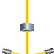 FIGURE 1: A gas of cesium atoms enters the clock's vacuum chamber. 