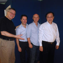 2011 picture from left to right of Charles Clark, Ignacio Cirac, Artur Ekert, and Andrew Chi-Chih Yao