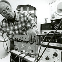William Bagley at an instrument