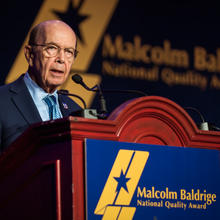 man standing at a podium