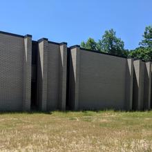 Outside view of windowless brick building