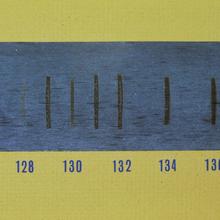 Black lines on a blue field are marked with numbers 128, 130, etc.
