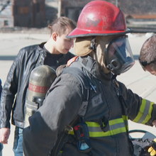 PSCR's Division Chief, Dereck Orr, is outfitted in firefighter gear that's being tested with a haptic feedback user interface. In this case, firefighter gloves contained the haptic feedback technology.