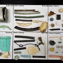 Photograph of plastic debris consisting of large and small fragments with a variety of shapes and colors. 