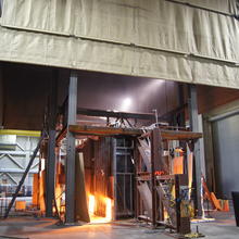 A fire test of an office building floor replica occurring in a fireproof compartment.