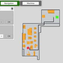 Tablet view of a factory. There are a number of machines with a path traced between two of them. 