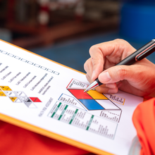 image of health safety inspector checking items on a clipboard