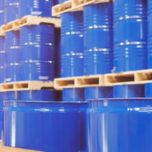 banner image of waste barrels in a factory