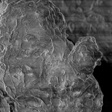 Black and white enlarged image of moon dust particle