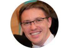 Alec Saville, person with short brown hair and glasses