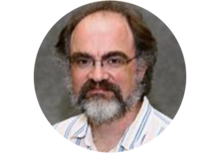 person with gray-brown hair and a gray-brown beard