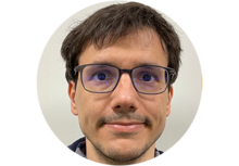 Mauro Mugnai, a person with short brown hair and glasses