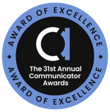 Circle badge. Center has a fancy lowercase "A" and reads: The 31st Annual Communicator Awards. The outer ring reads: Award of Excellence