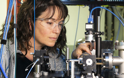 Scientist working at scientific equipment