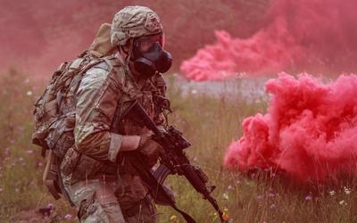 Photo of a soldier wearing a gas mask. 