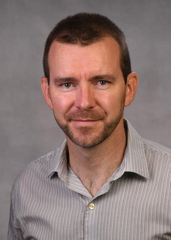 Oliver Slattery headshot. 