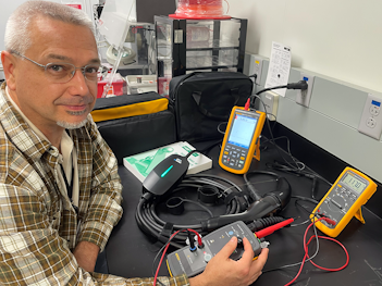 Mike Stocker working with EVSE equipment