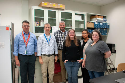 NIST scientists who worked on the bird flu genetic material in a lab.