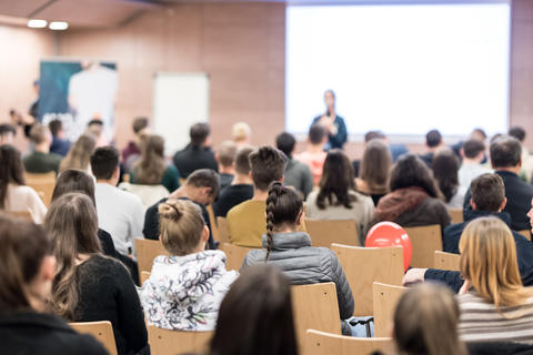 Large classroom from back facing the front - shutterstock_1608993631