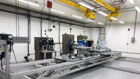 Inside of an xray calibration lab. Long table with equipment on top