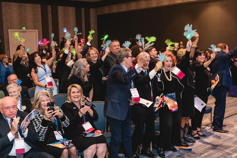 Fans cheering at the 36th Baldrige Award Ceremony