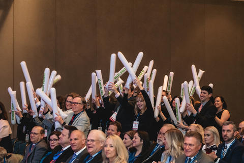 Fans cheer at the 36th Baldrige Award ceremony.