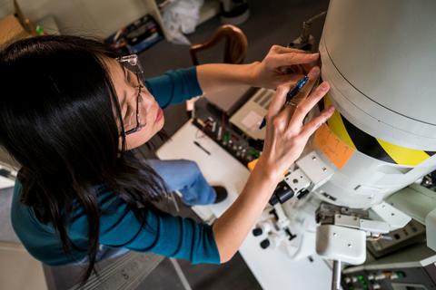 June Lau working in a lab