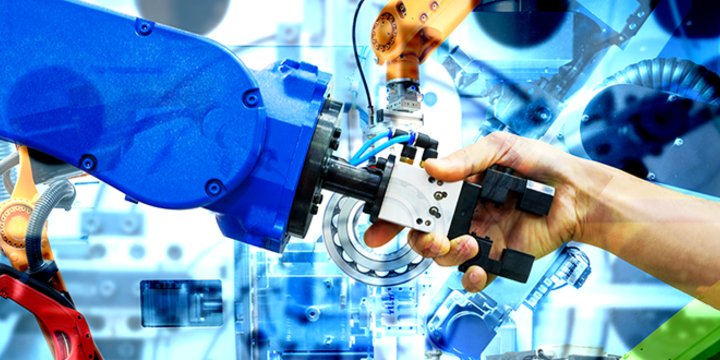 robot shaking hands with a human in a manufacturing facility
