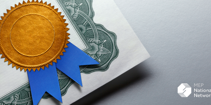certificate with a gold seal and ribbon