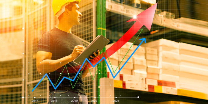 engineer man wearing safety helmet doing stock tick check and cardboard stock product management in factory warehouse background and profit chart grow up