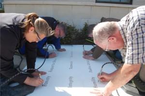 49-midwayusa-employees-engrave-9-company-values-in-campus-sidewalks-300x199.jpg