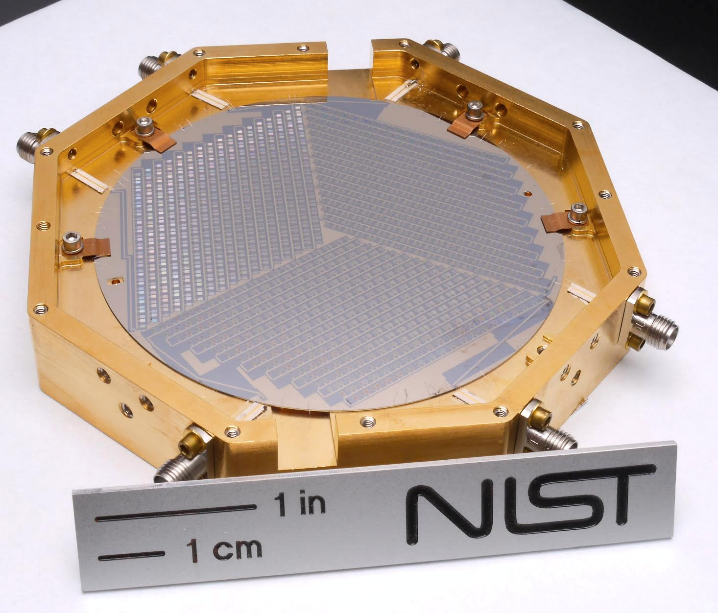 An octogonal metal plate is displayed with a plaque indicating size.