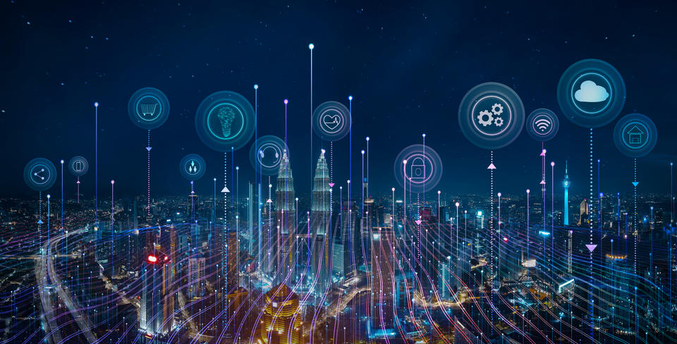 Panorama aerial view in the cityscape skyline with smart services and icons, internet of things, networks and augmented reality concept , night scene .