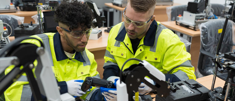 Two male engineers training
