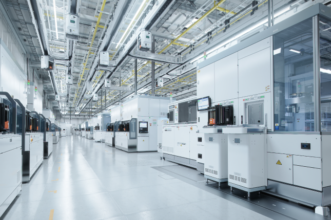 image of the inside of a semiconductor manufacturing facility with equipment and safety regulated systems