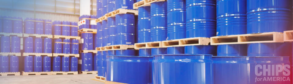banner image of waste barrels in a factory