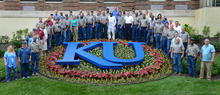 photo outdoors featuring group of facilities workers