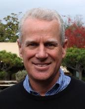 white haired man