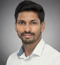 Abheek Chatterjee poses for a head shot