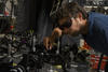 NIST physicist Krister Shalm with the photon source used in the Bell test