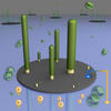illustration. gray disk. green rods come up from the disk.