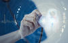 University of Kansas Medical Center Cybersecurity blog photo. Shows a doctor using a stethoscope on a cybersecurity lock.