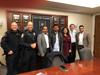 Photo of seven-member team from the Tech to Protect Challenge. Two are police officers; five are in corporate clothing.