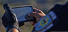 First responder holding a smartphone