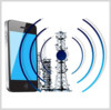 Smart phone superimposed next to cell tower. Symbolic waves emanating from the tower.