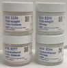 Picture of jars containing reference materials 8256, 8257, 8258, and 8259: Wild caught and aquacultured shrimp and salmon