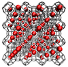 Illustrated cube has crystal framework in gray with red balls interspersed in the open spaces.