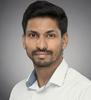 Abheek Chatterjee poses for a head shot