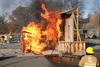 Researchers burn a shed to measure the fire exposure to a nearby residential façade to determine safe separation distance and test WUI fire building code requirements.